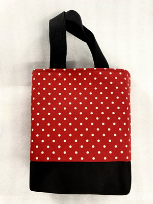 red polka dot bag